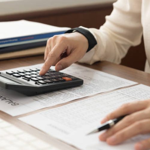 Business women reviewing data in financial statement. Accounting , Accountancy, Bookkeeping Concept.